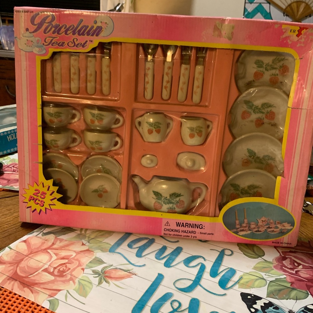 Porcelain tea set.  25 pcs. New never revived from box.